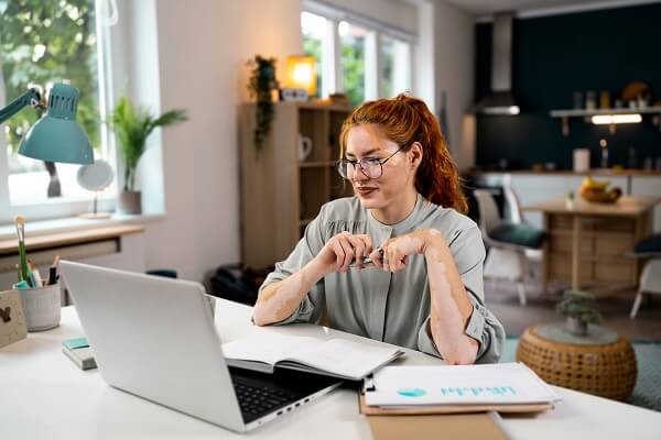 Woman Red Hair Smiling At Laptop