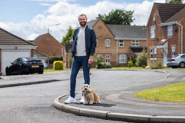 Man And Dog On Street House