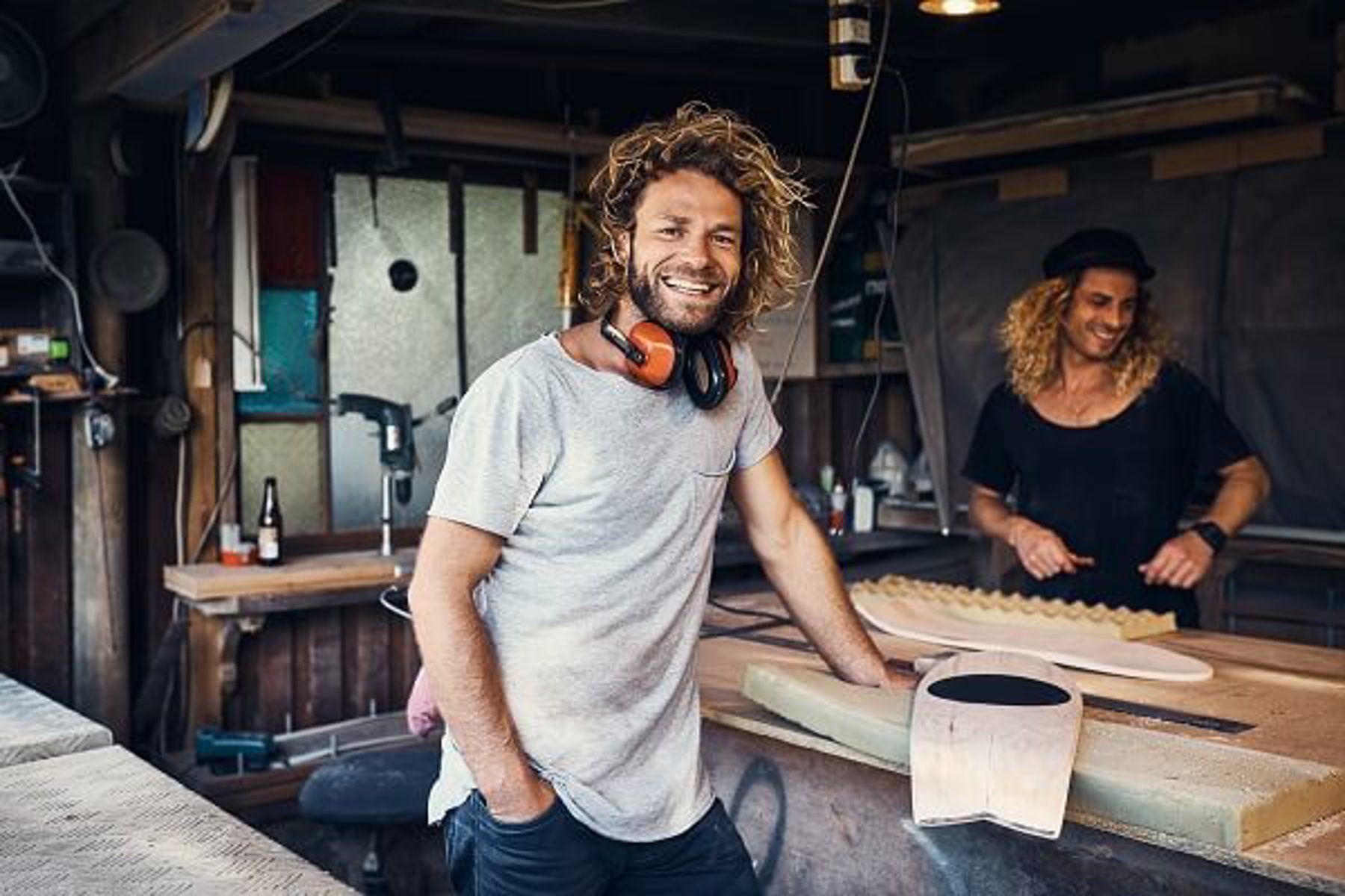 Two Blonde Men Working With Wood