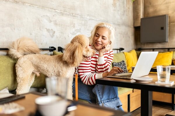 Blonde Woman Looking At Dog