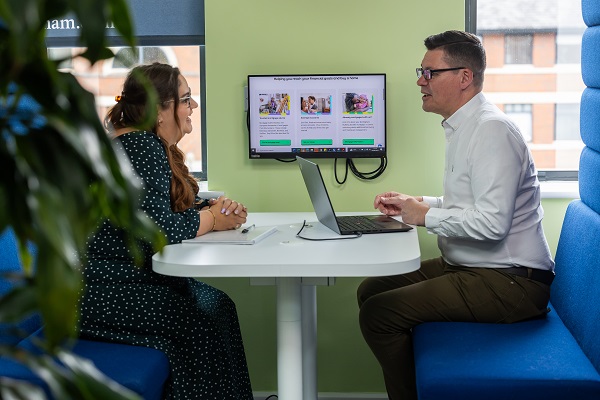 Colleagues Talking In Community Area